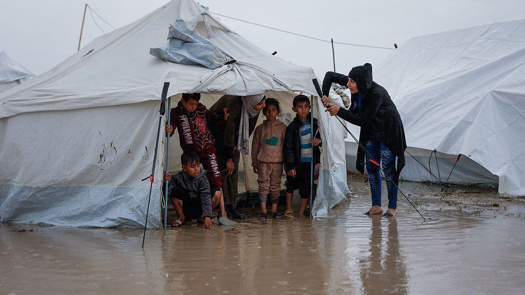 The floods make it hard for Gazans to keep children dry