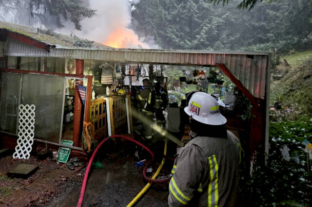 Fire districts respond to structure fire on Dan Kelly Road