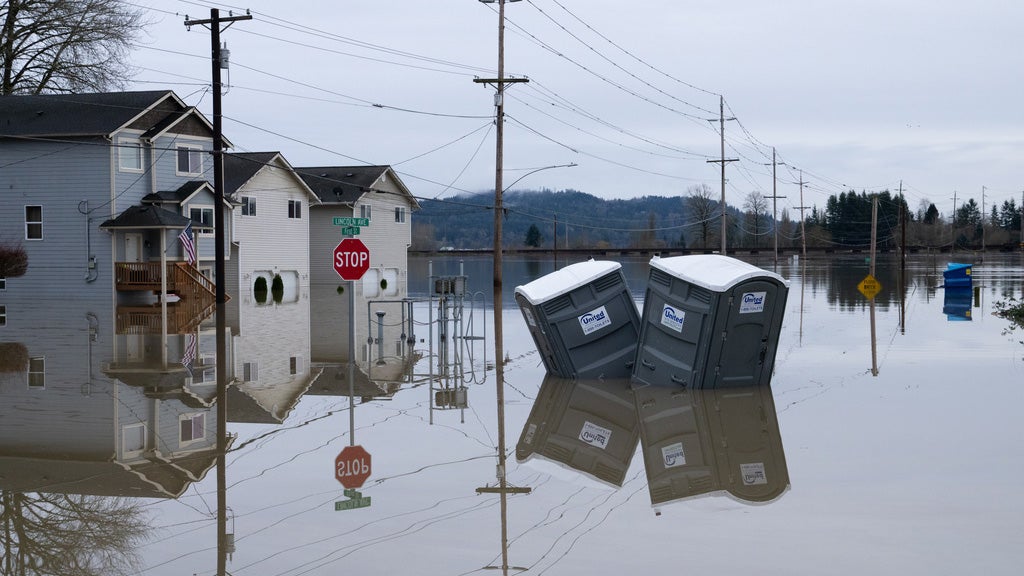 Families stranded, homes washed away as rivers keep rising in historic ...