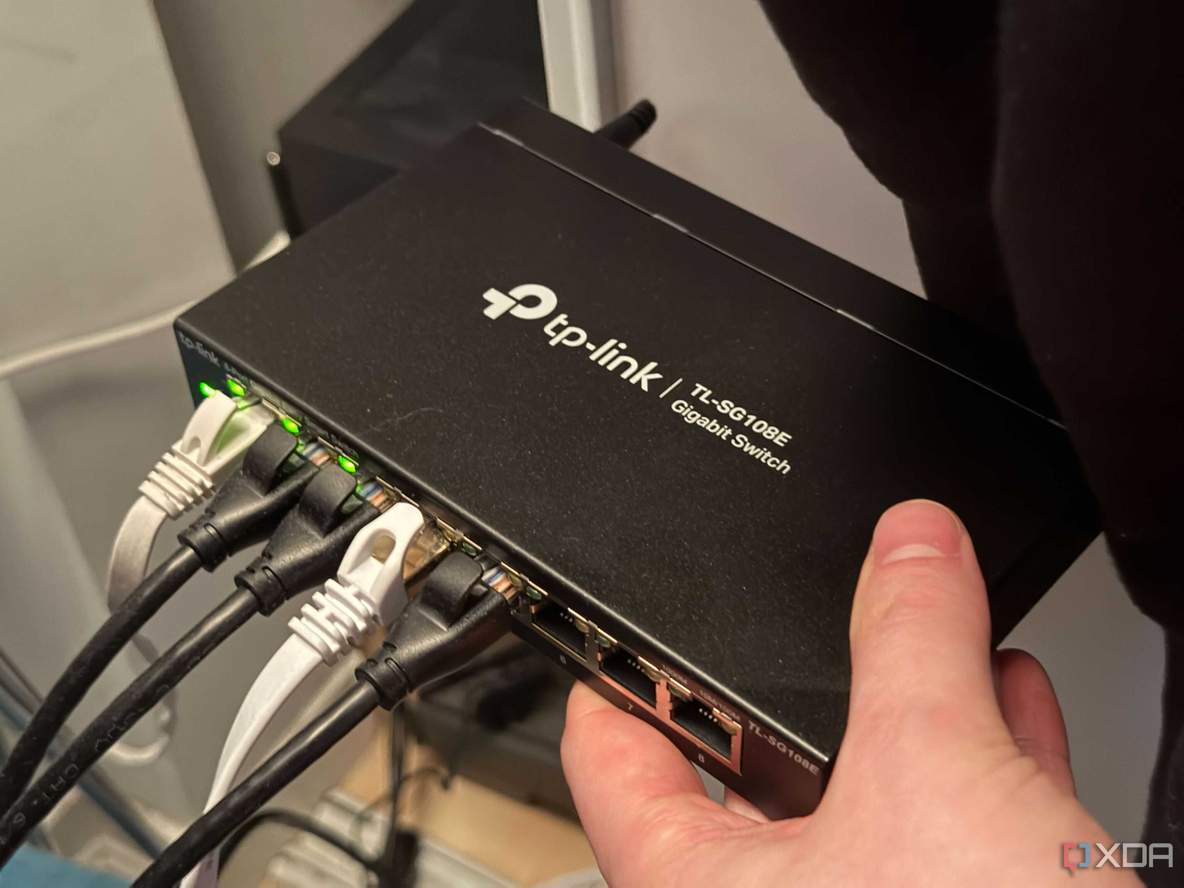 A photo of a black 8-port switch