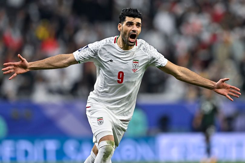Mehdi Taremi of Iran is celebrating after scoring a goal during the AFC Asian Cup 2023 match between Iran and the United Arab Emirates at Education City Stadium in Al Rayyan, Qatar, on January 23, 2023. (Photo by Noushad Thekkayil/NurPhoto via Getty Images)
