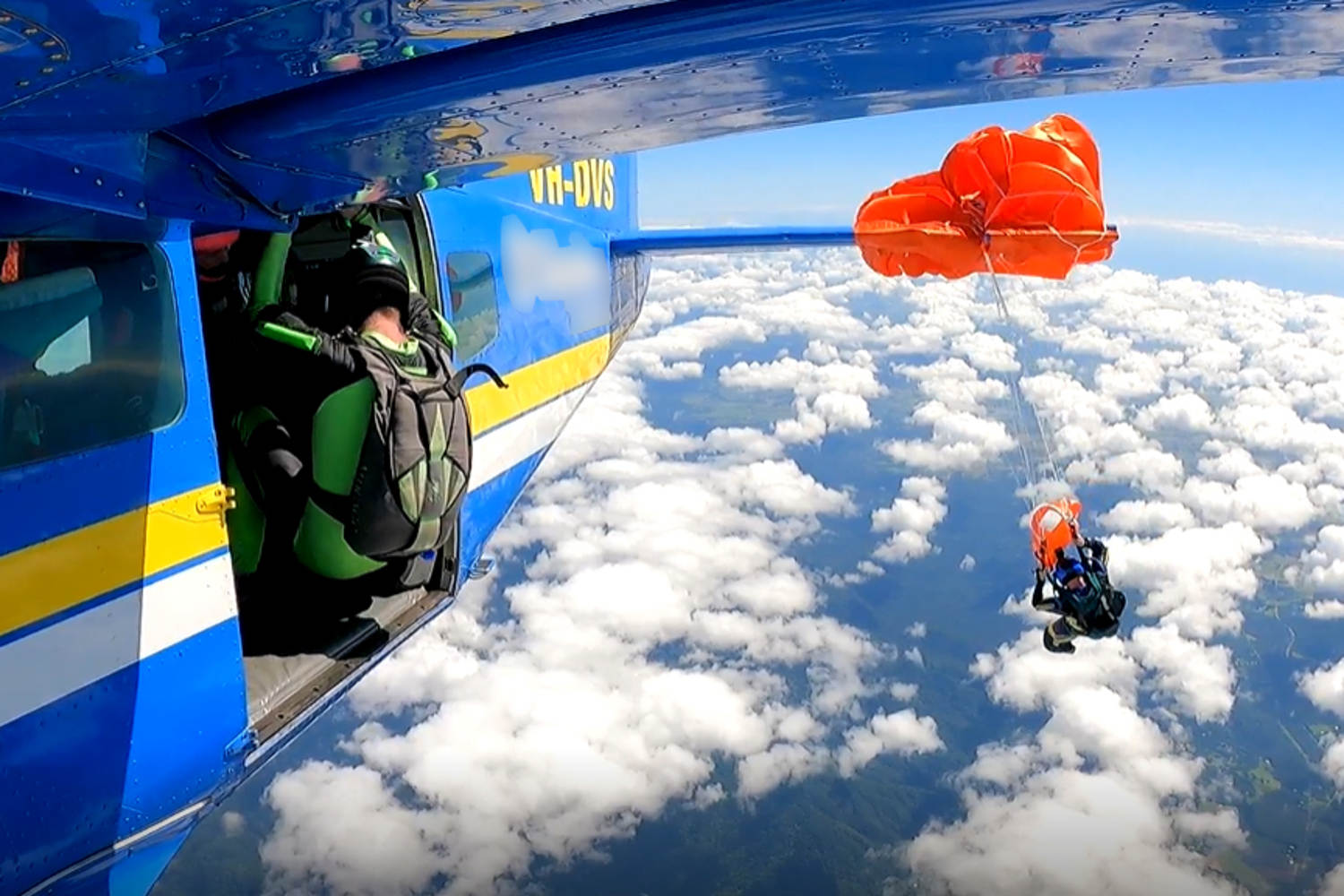 Skydiver suspended at 15,000 feet after parachute gets snagged on plane ...