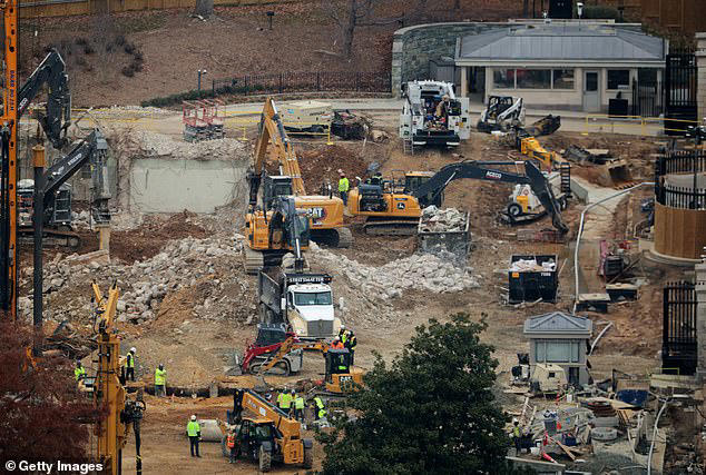 Construction crews work in the area where the East Wing once stood earlier this month. Friday's lawsuit could further delay the project after the head architect was replaced  