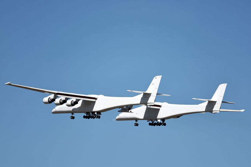 Astonished locals spot strange plane bigger than football field soaring ...