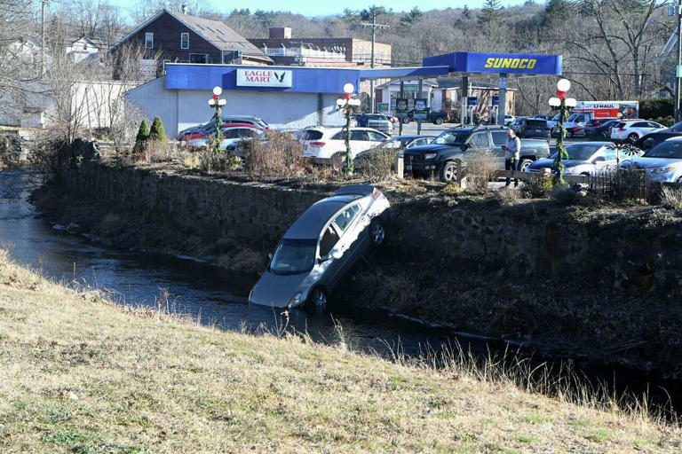 Driver rescued after car crashed into river in Stafford, officials say