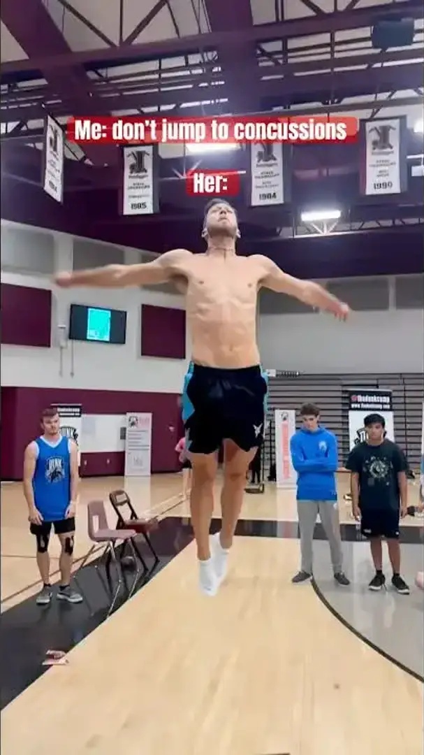 Her: Jumping as high as possible