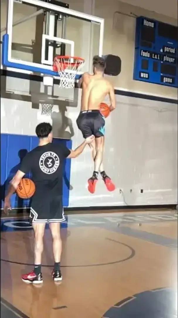 Incredible assisted dunk attempt