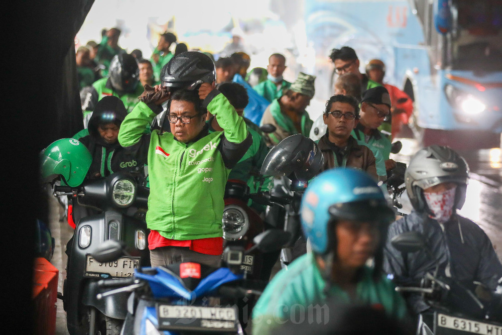 Tumpukan Catatan di Tengah Perpecahan Merger Gojek-Grab