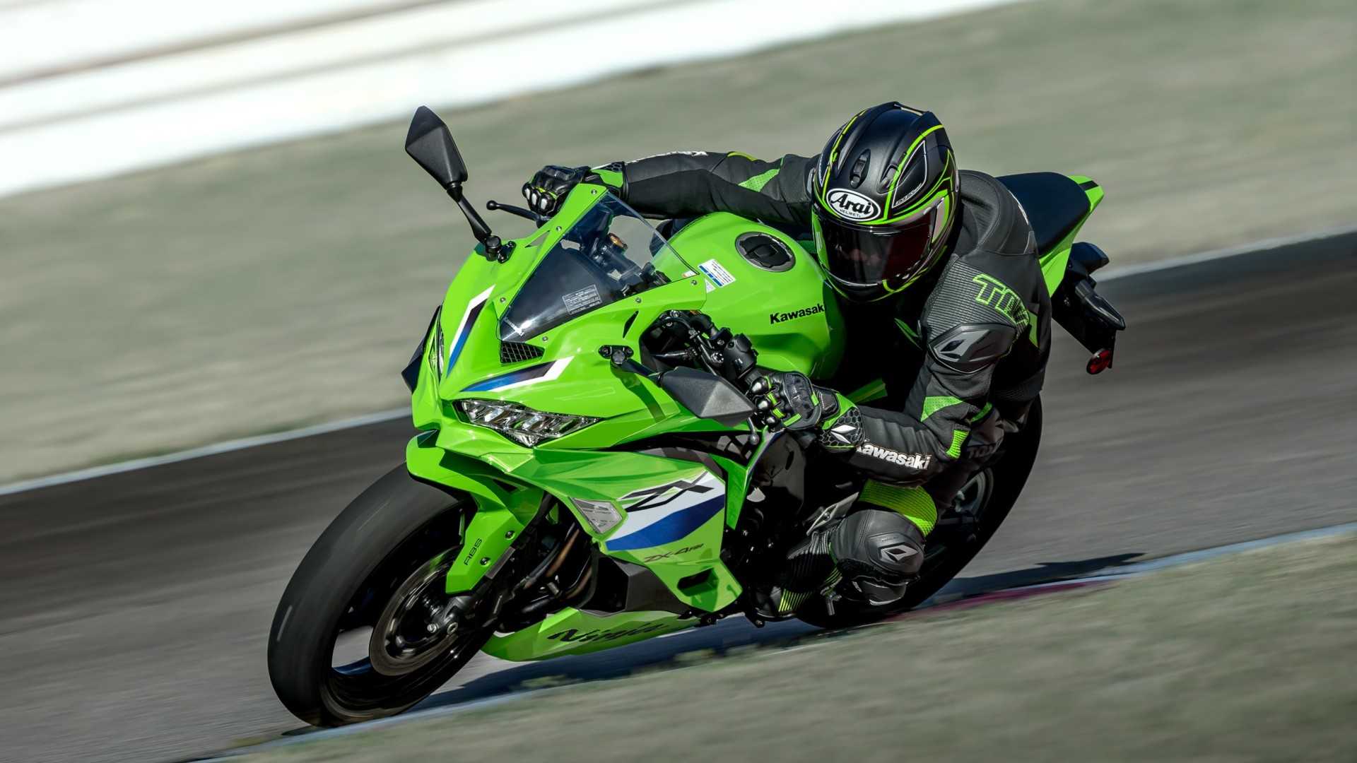 Kawasaki Ninja ZX-4R cornering on a racetrack
