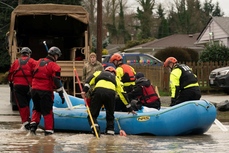 Historic rains and flooding trigger dramatic rescues in Washington state