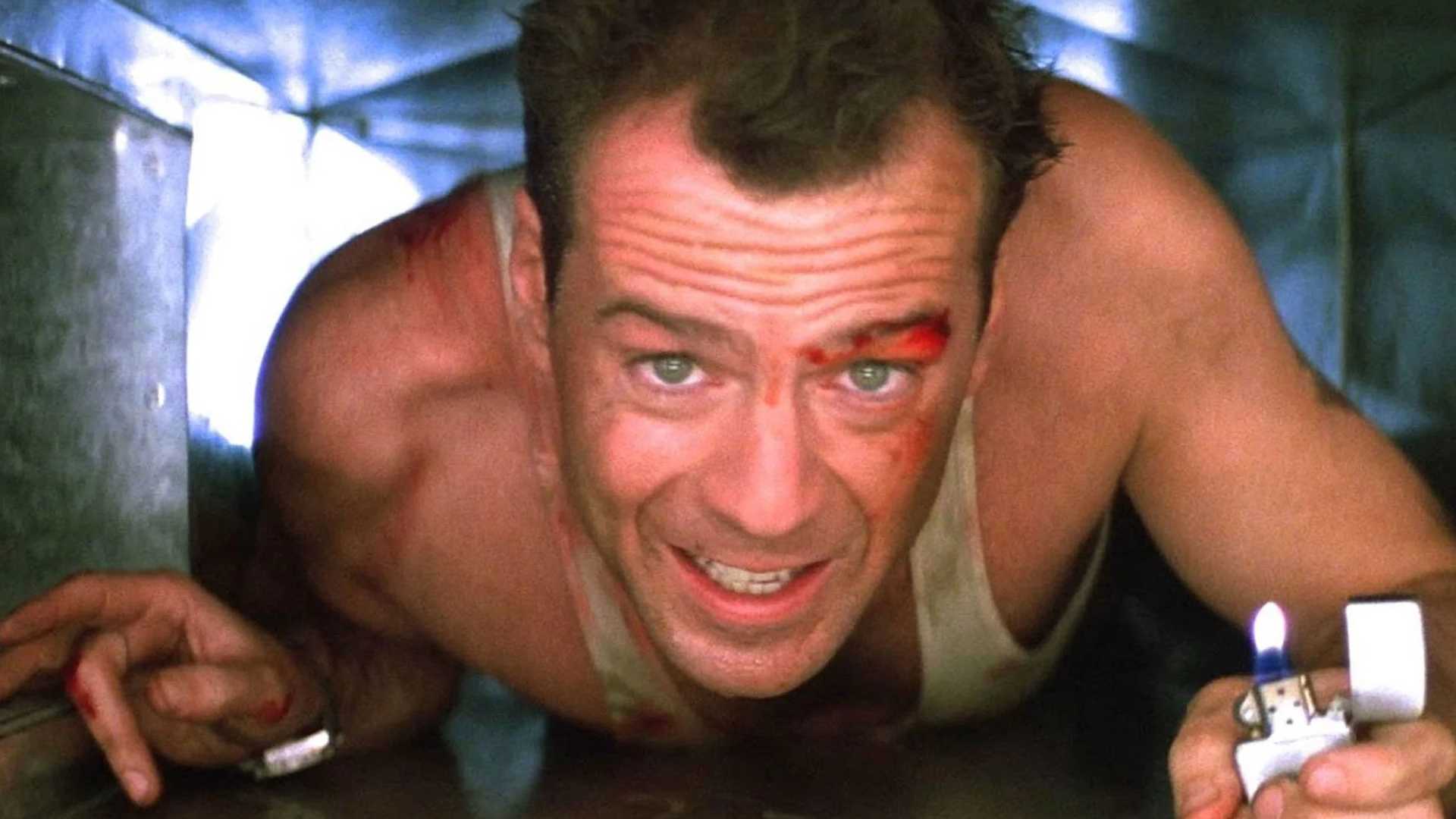 Bruce Willis climbs through vents in Die Hard