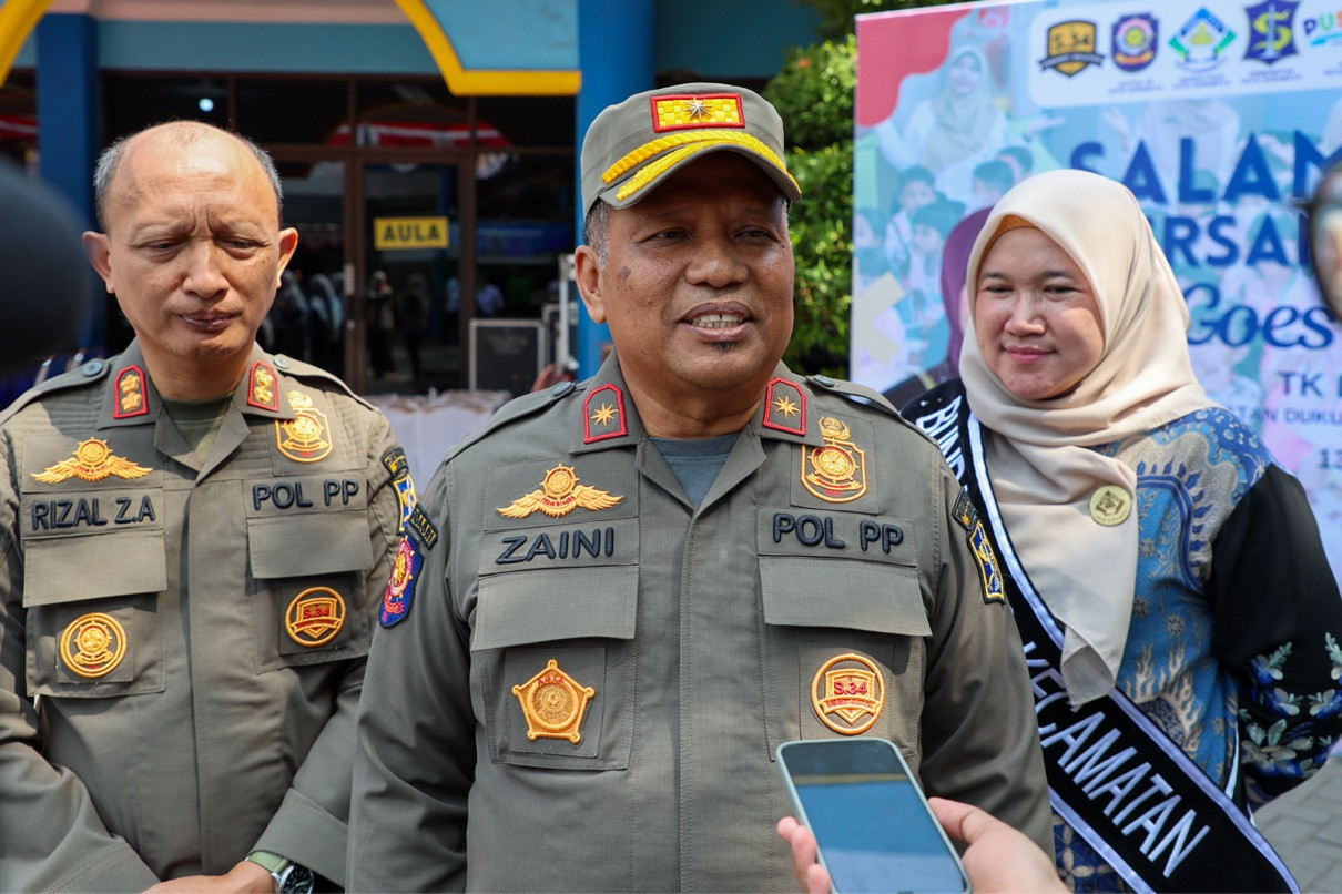 Satpol PP Surabaya Tindak Tegas Anggota Korupsi PKL