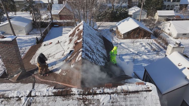 Ice dams keep crews busy as winter weather grips the Twin Cities