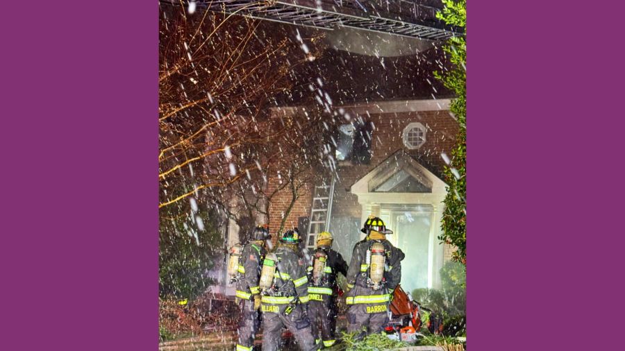 Firefighters battle Northwest DC house fire amid snowy conditions