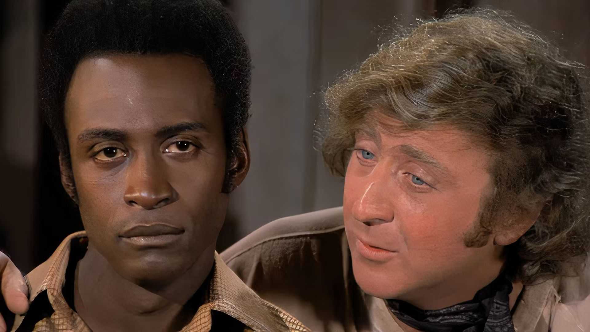 Gene Wilder as Jim the Waco Kid with his arm around Cleavon Little as Bart in Blazing Saddles