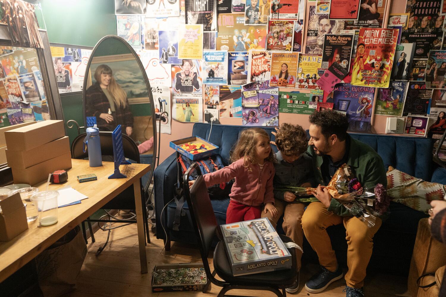 Ahmed Bharoocha, right, greets his wife, Abby Londer, and children, Rukaiya and Walter Bharoocha, after his performance at the Lyric Hyperion. ((Karla Gachet / For The Times))