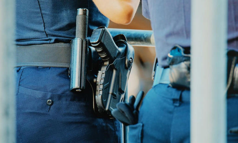 Armed officers appear to guard women’s bathrooms after trans ban