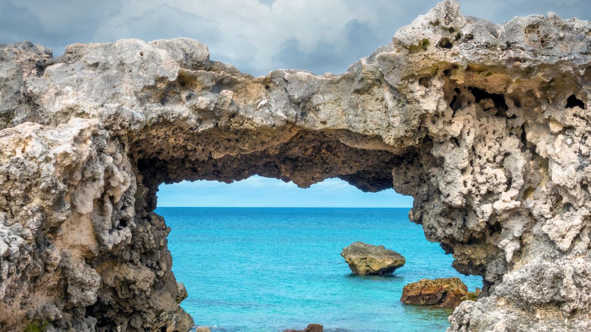 The chemistry of Bermuda's rocks has allowed the formation of tunnels like this, and that chemistry provides one explanation for what supports the rise Bermuda sits on. - Image credit: LouieLea/Shutterstock.com