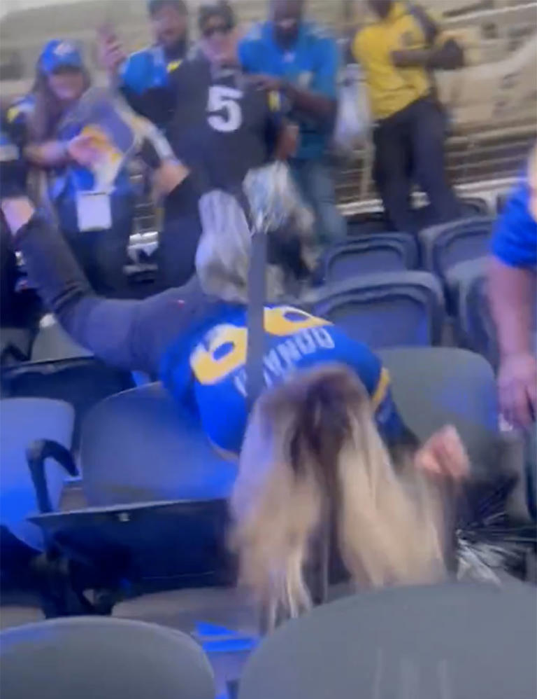 Rams fan tumbles down several rows after trying to kick spectator in ...