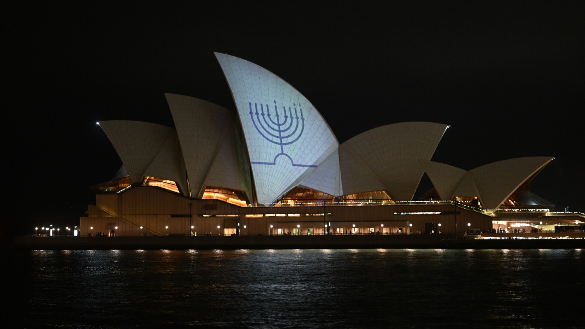 Landmarks light up across Australia to honour victims of the Bondi massacre