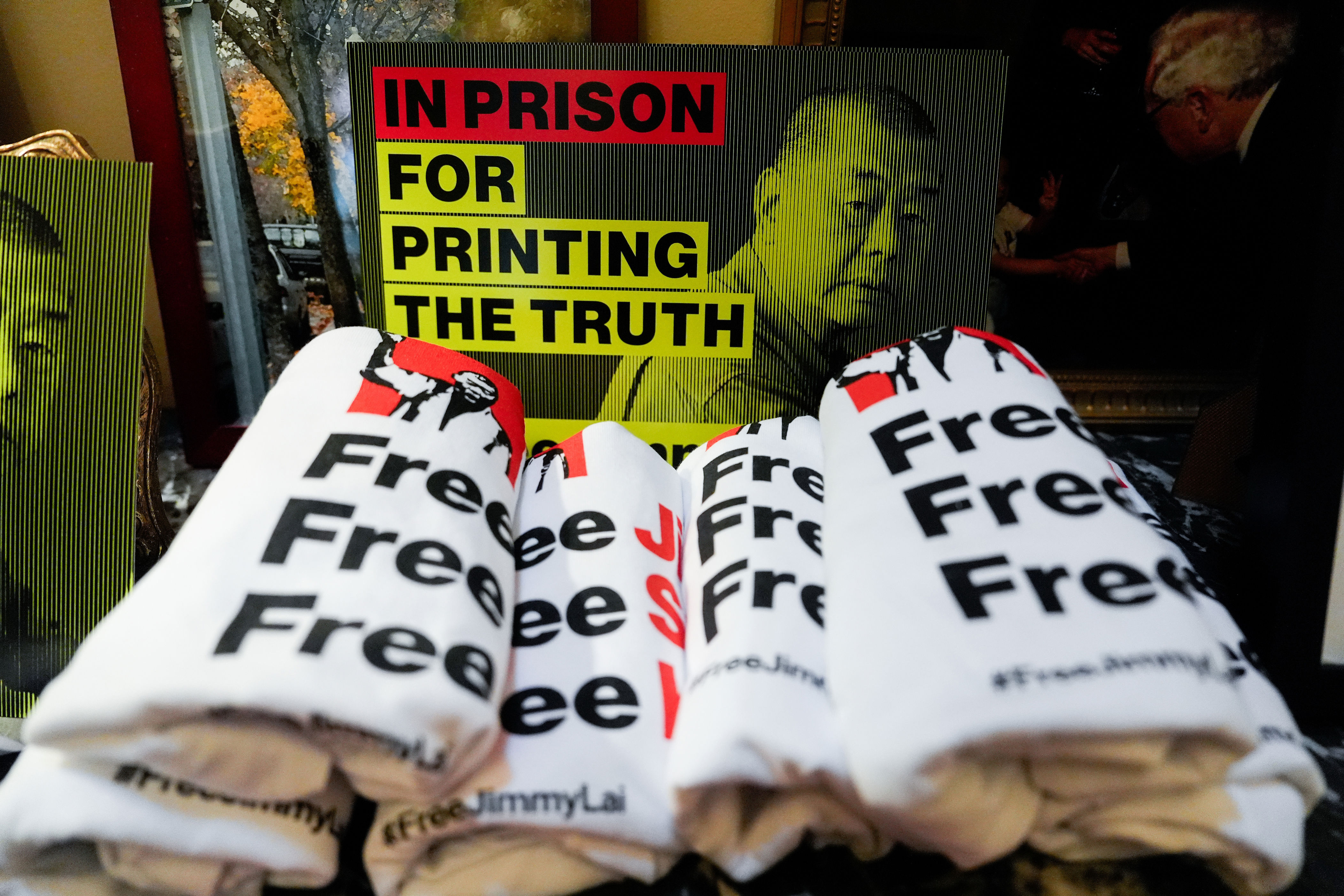 Jimmy Lai’s supporters have made T-shirts and pins to raise awareness of the jailed publisher’s plight.
