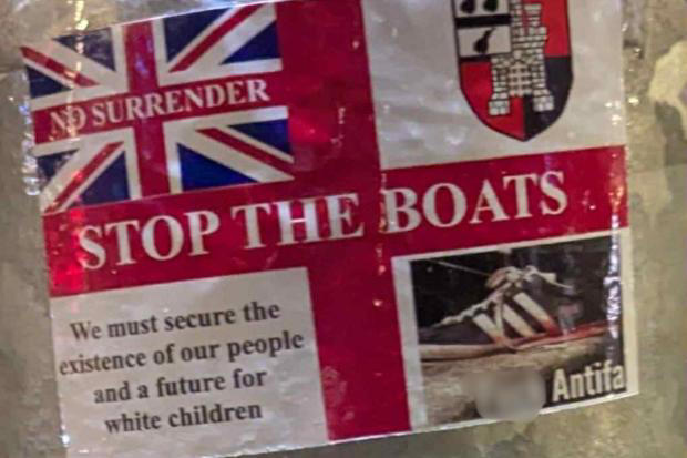 Fury over Neo-Nazi slogan stickers in city as anti-fascists speak