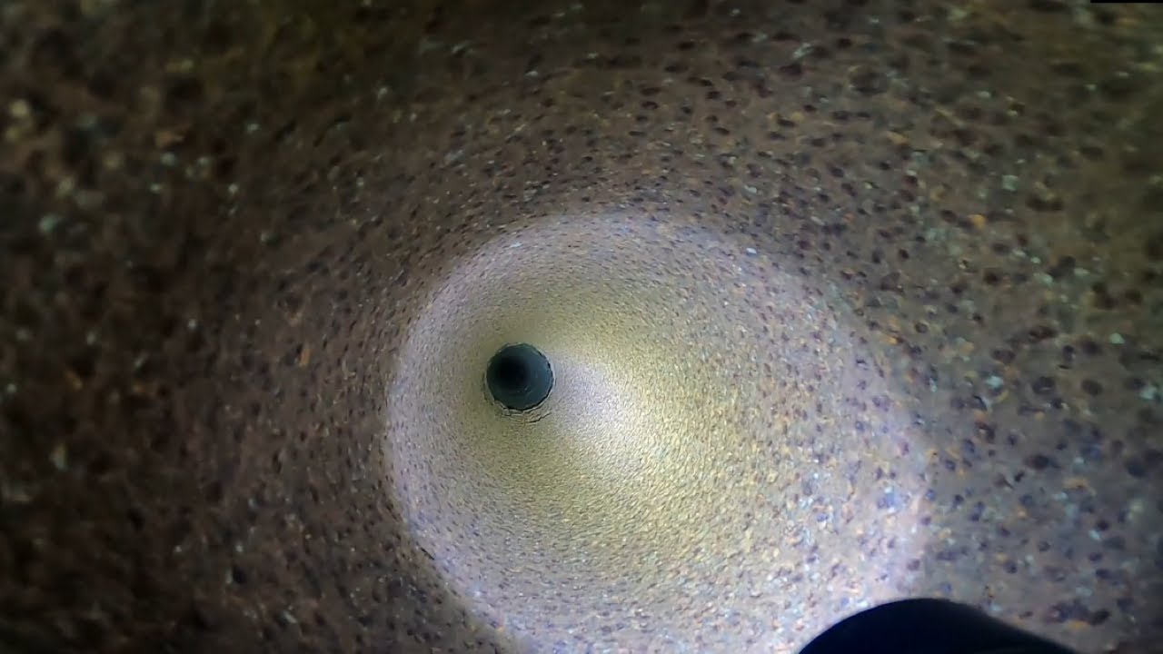 Dropping a GoPro down a deep mystery pipe - something is down there