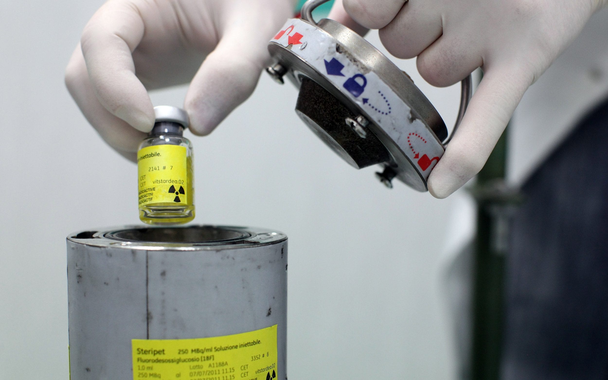 An employee works at a radiopharmaceutical plant