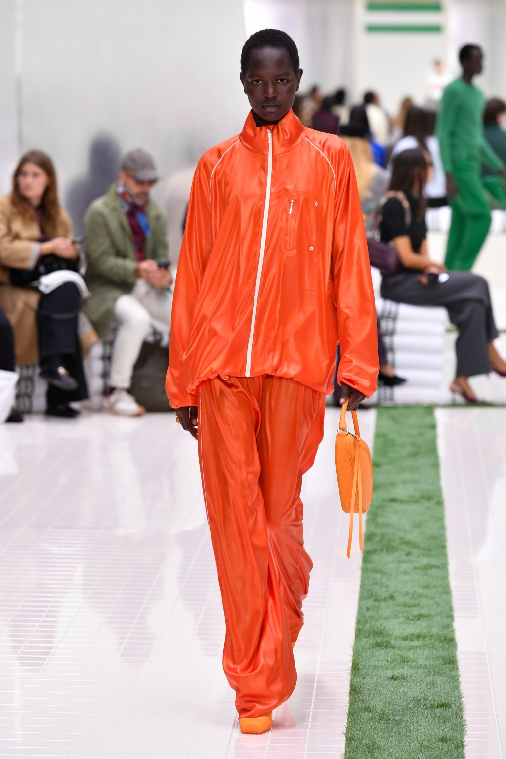 Gwyneth Paltrow sports 'Marty Supreme' orange on 'Late Night with Seth ...