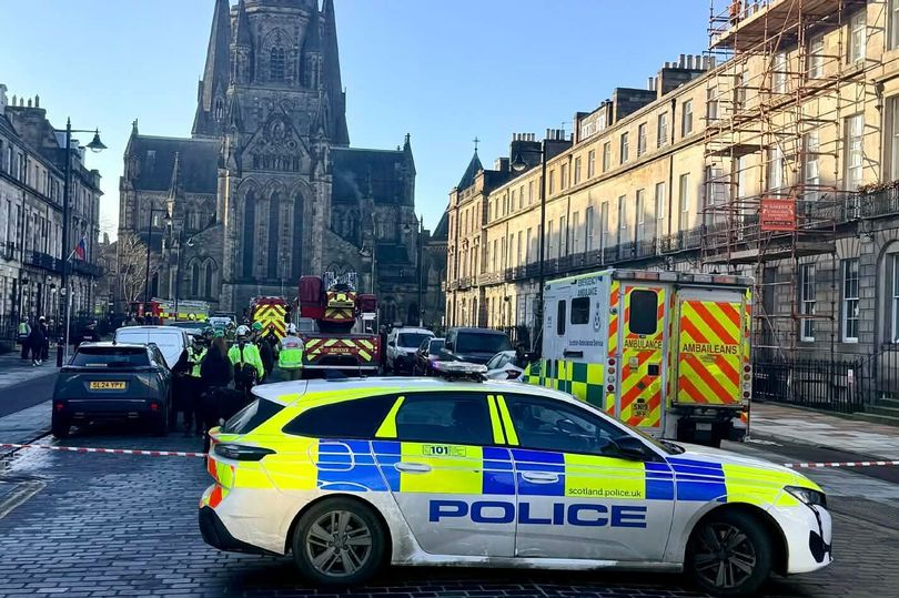 Edinburgh centre city street taped off as emergency services respond to ...