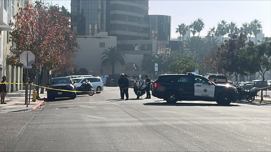 SWAT team, police respond to report of barricaded suspect in downtown ...
