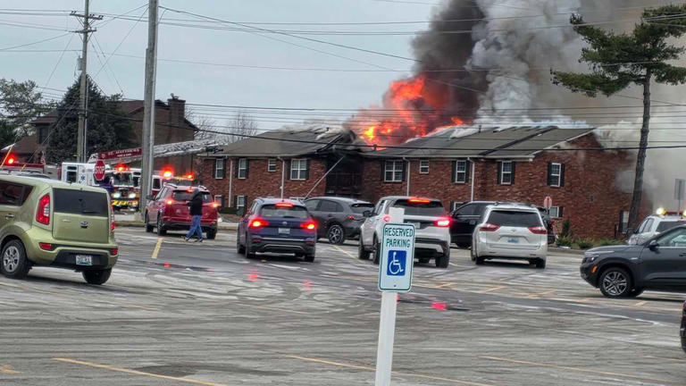 Apartment building off Westport Road catches fire after vehicle crashes ...