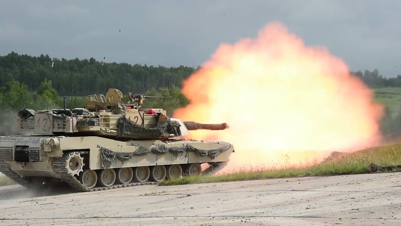M1A2 tanks bounding & searching for targets
