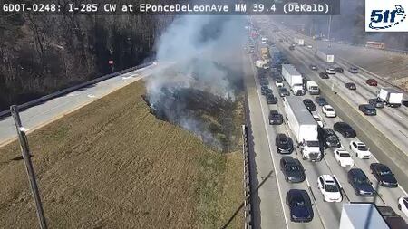 Garbage truck fire shuts down lanes on I-285 south in DeKalb County