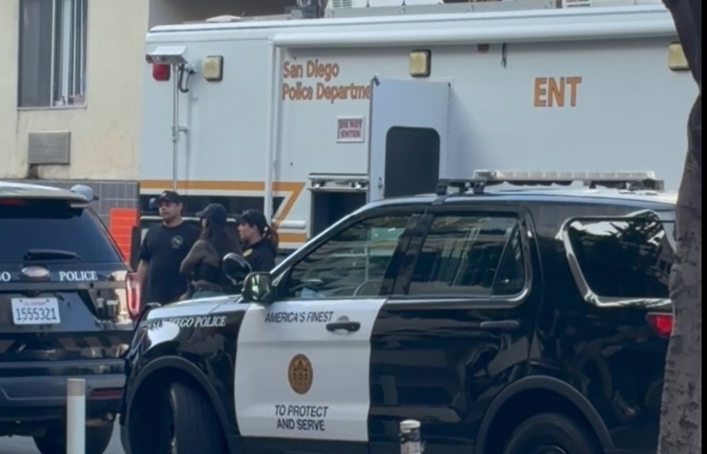 Police SWAT team responds to barricaded suspect in Gas Lamp
