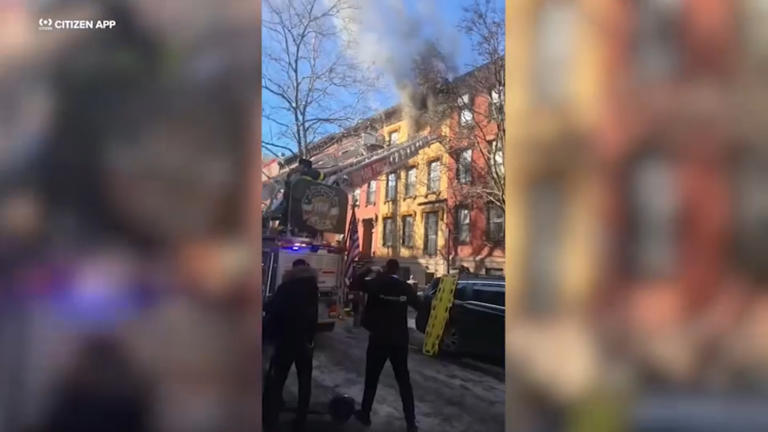 Man in critical condition after jumping from burning brownstone in ...