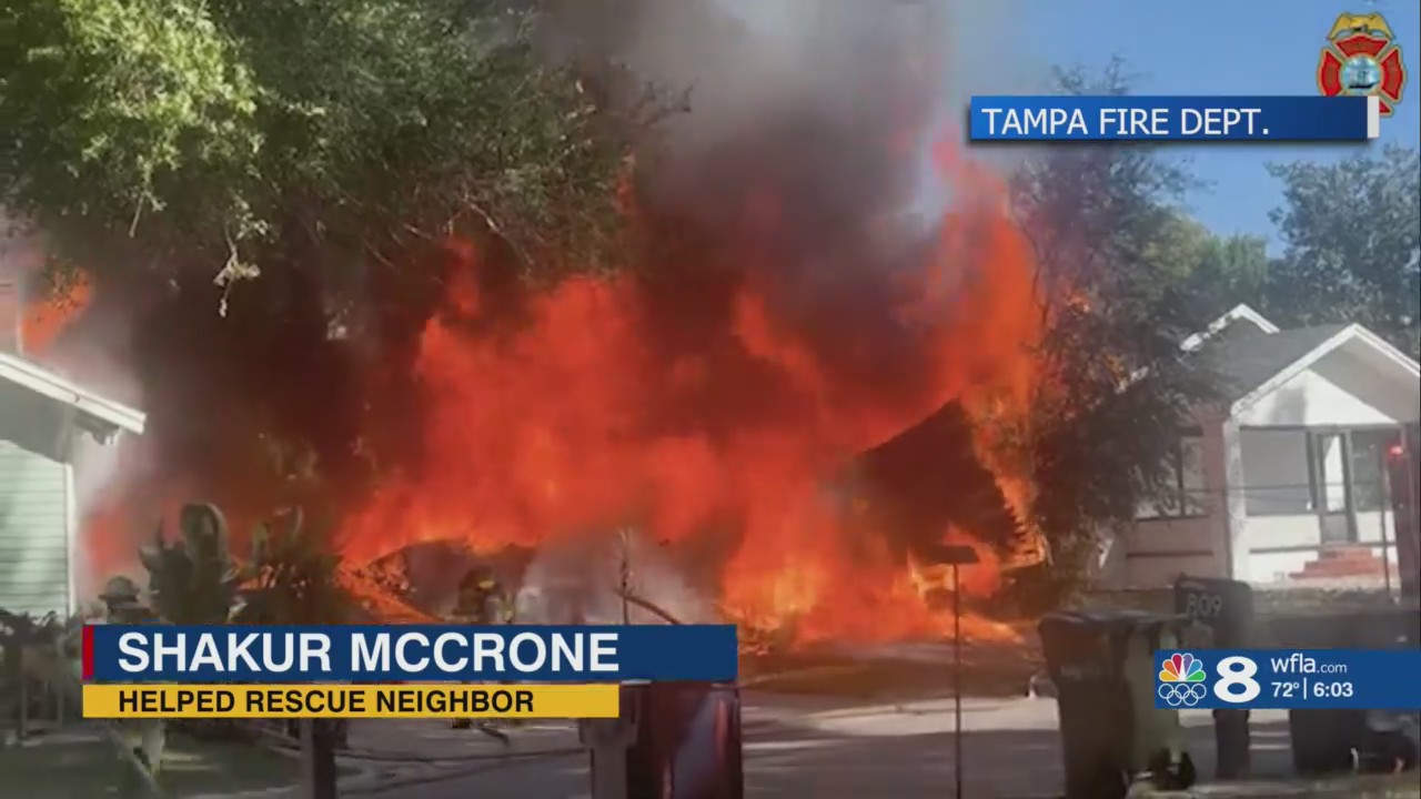Neighbors help rescue woman inside Tampa home near a massive fire