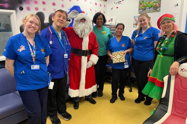 Santa visits children on hospital ward to spread Christmas cheer