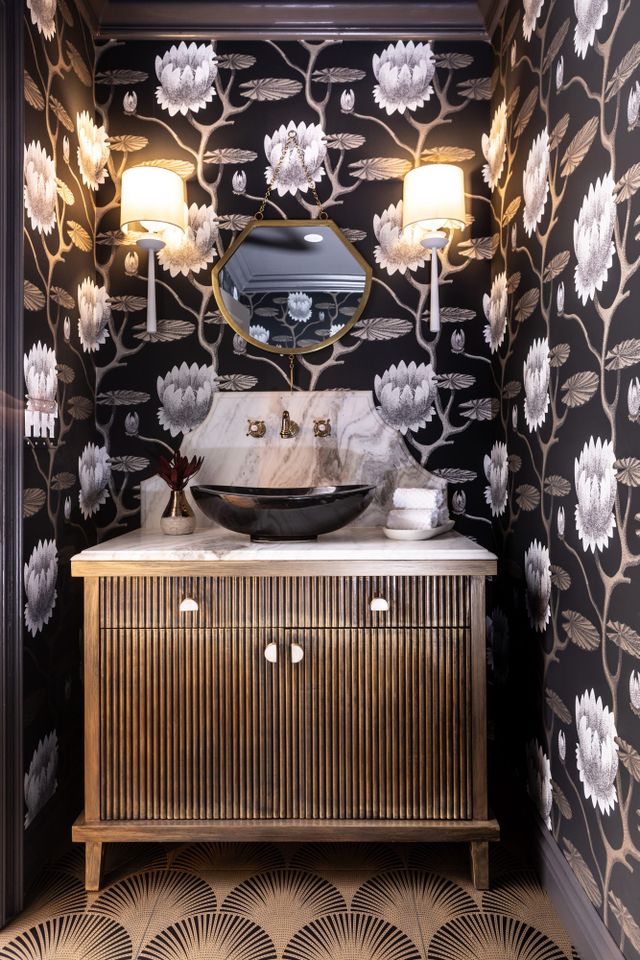 Bold, dark floral wallpaper bathroom