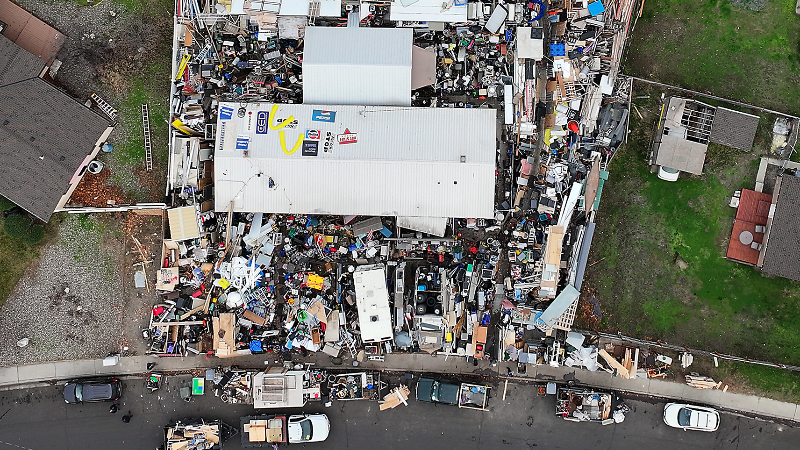 Mountain of debris engulfs home. Richland calls it an 