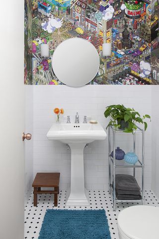 Bathroom with patterned wallpaper and white tile