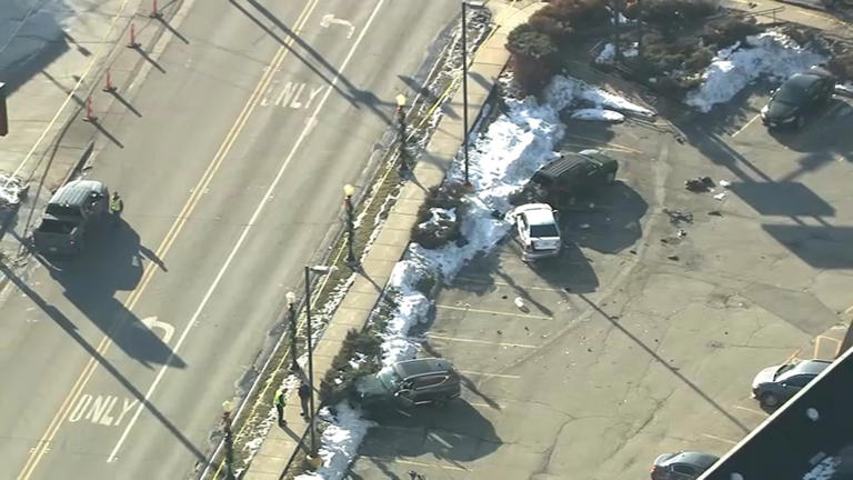 Roads closed after driver crashes into busy west suburban Walgreens ...