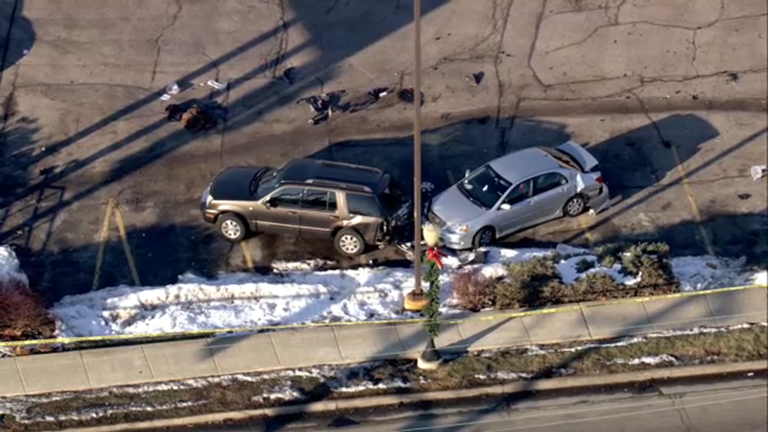 Pedestrian killed, 2 officers injured after driver crashes into squad ...