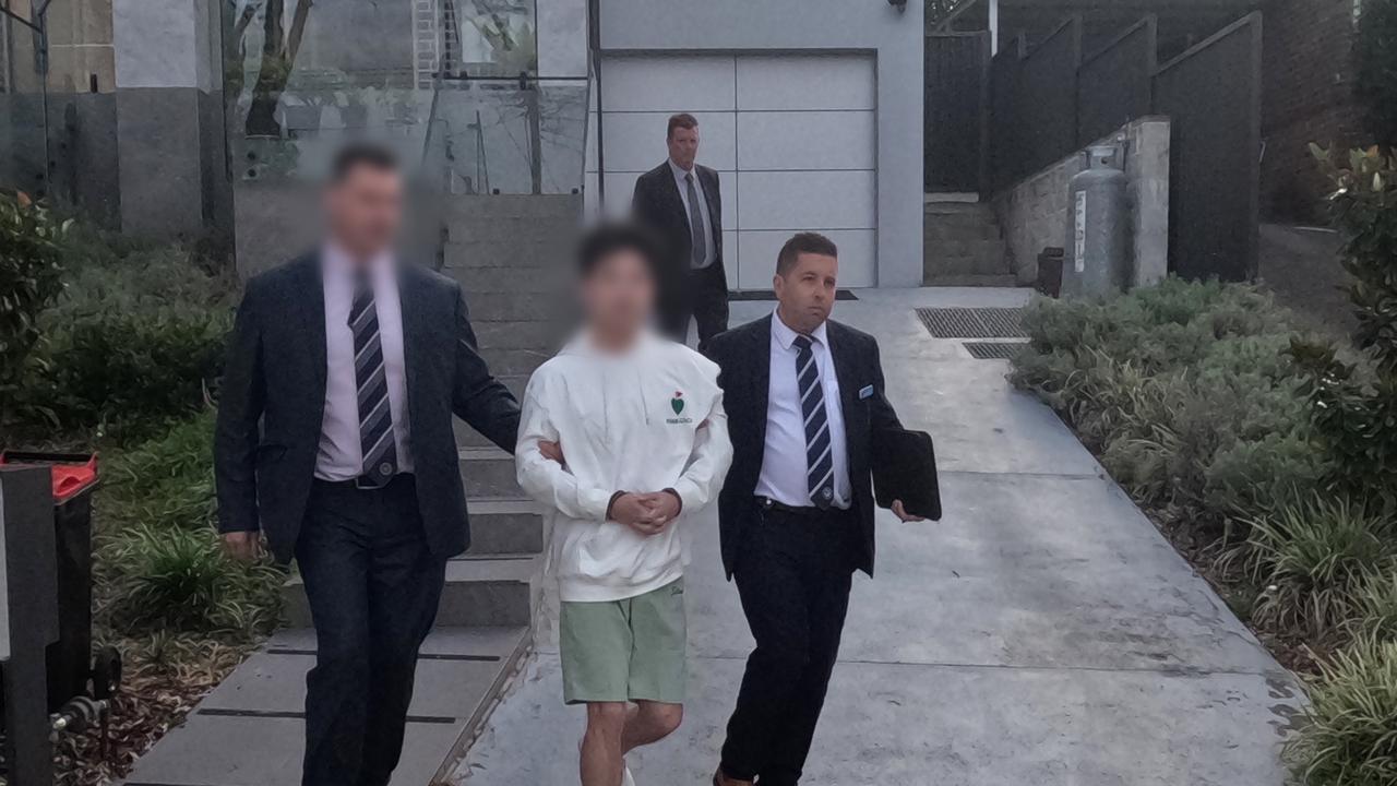 Ex-banker charged over alleged $105m fake loan scheme