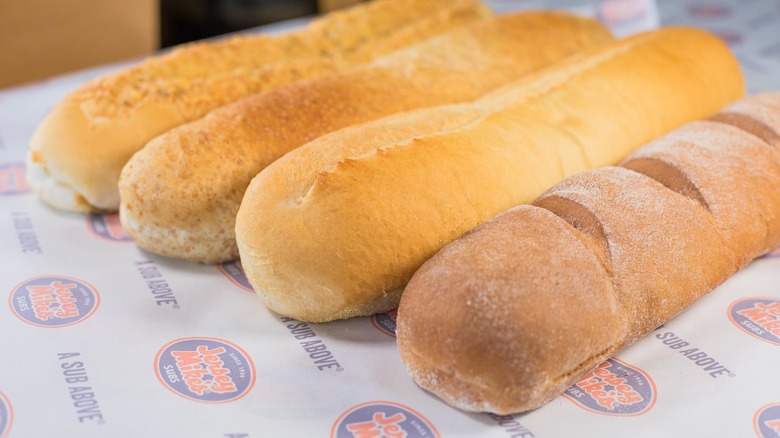 Four loaves of bread on Jersey Mike's paper