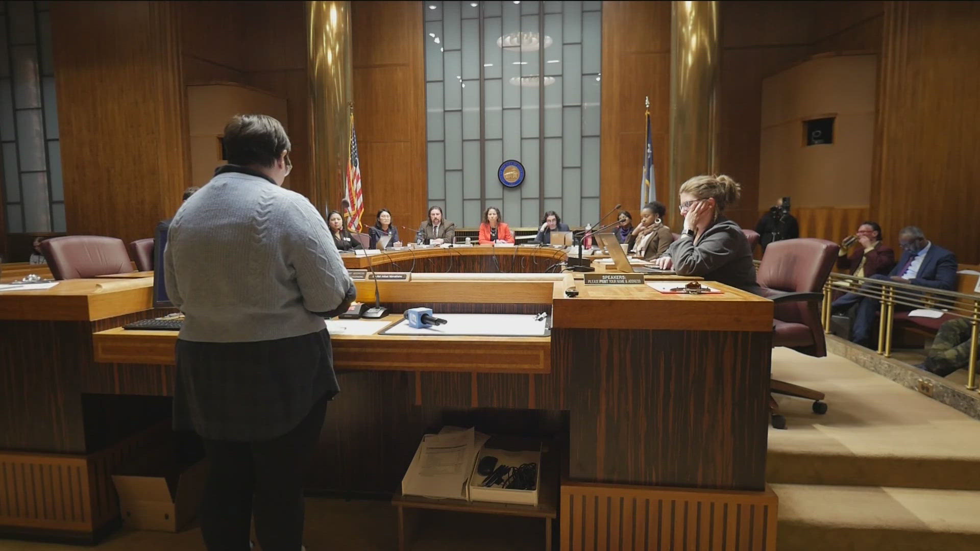 Dozens of people speak out in St. Paul after immigration activity, tense encounter with PD<br>