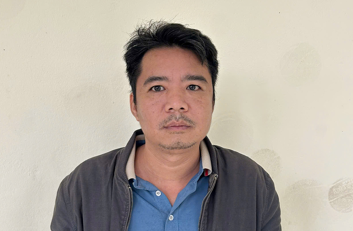 Nghi can Thế tại cơ quan điều tra. Ảnh: Hùng Lê