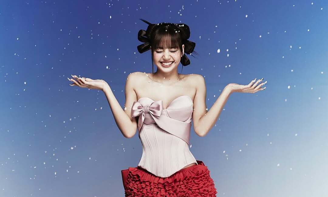 Blackpink's Lisa wears Vietnamese designer's dress in Christmas shoot