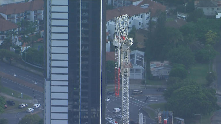Crane hits Gold Coast building after snapping in storm