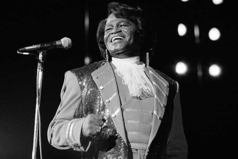 Rita Barros/Getty James Brown performs onstage at the Paramount in New York City on February 28, 1992